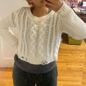 Cropped cable knit sweater